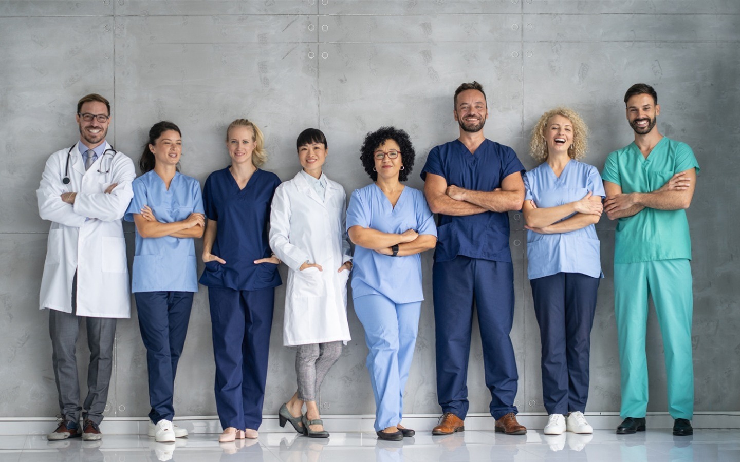 group of nurses and doctos smiling at camera